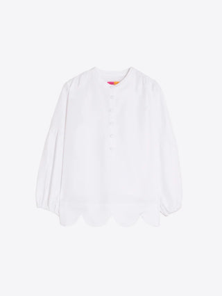 White shirt under waves