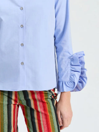 BLUE SHIRT WITH SIDE RUFFLES