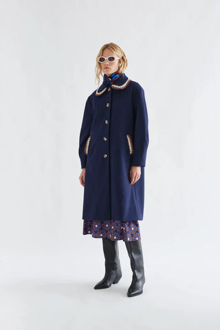 Navy blue coat with crochet details