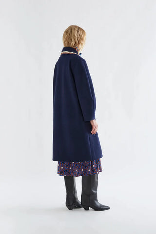 Navy blue coat with crochet details