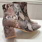 Daviana white/blush snake bootie