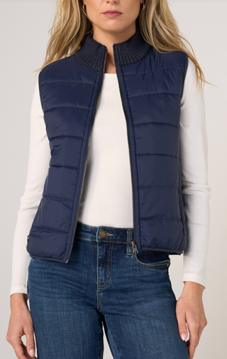 Sleeveless reversible zip front quilted sweater vest